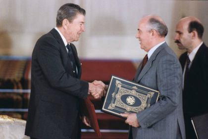 President_Reagan_and_Soviet_General_Secretary_Gorbachev_shake_hands_after_signing_the_INF_Treaty