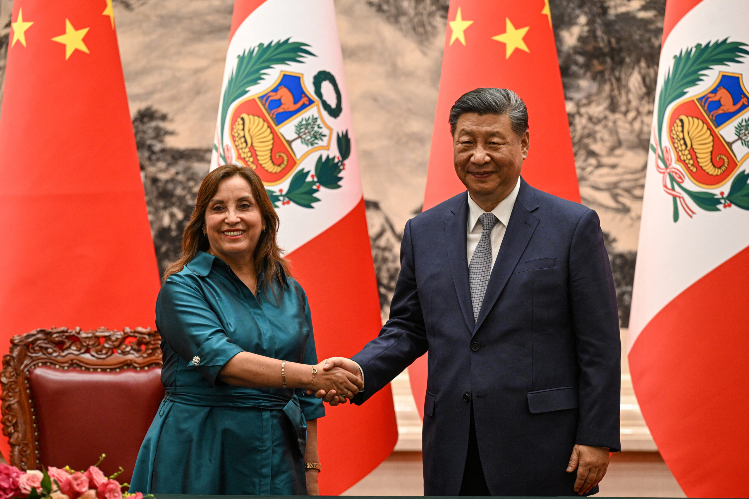 China's President Xi Jinping and Peru's President Dina Boluarte shake hands during a signing ceremony at the Great Hall of the People in Beijing, China June 28, 2024. JADE GAO/Pool via REUTERS